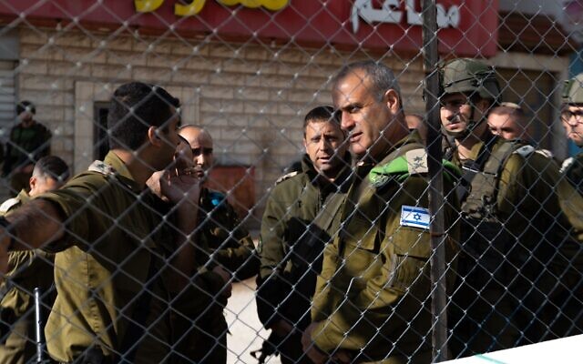 Maj. Gen. Yehuda Fox tours the scene of a shooting attack in the West Bank town of Huwara, March 26, 2023. (Israel Defense Forces).