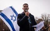 Col. (Res.) Ophir Bear, a 27-year Israeli Air Force figher pilot, speaks against the government's judicial overhaul plans at a rally in New York City, March 12, 2023. (Luke Tress/Times of Israel)