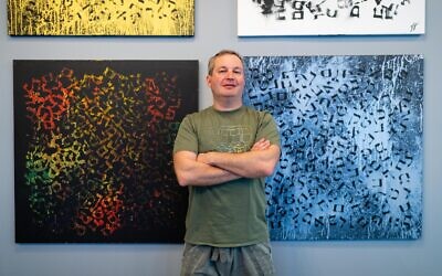 Artist David Roytman at his new gallery in New York City, March 15, 2023. (Luke Tress/Times of Israel)