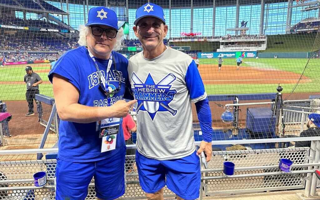 Stu Moss, left, and David Bogatz at Team Israel's game against Puerto Rico, Monday, March 13, 2022, at the World Baseball Classic in Miami. (Jacob Gurvis/ JTA)