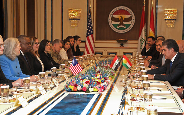 President of the Iraqi Kurdistan autonomous region Nechirvan Barzani (R) meets with US Defense Secretary Lloyd Austin in Arbil on March 7, 2023. (SAFIN HAMED / AFP)