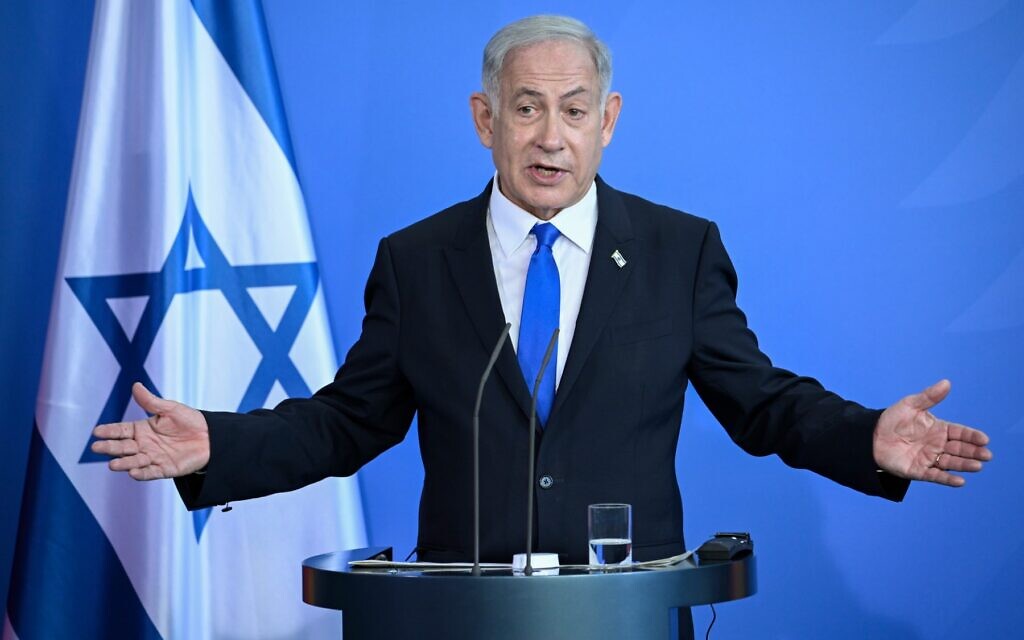 Prime Minister Benjamin Netanyahu speaks at a press conference in Berlin on March 16, 2023. (Tobias Schwarz/AFP)