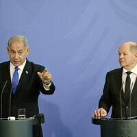 German Chancellor Olaf Scholz (R) and Israeli Prime Minister Benjamin Netanyahu give a joint press conference following talks at the Chancellery in Berlin on March 16, 2023. (Tobias SCHWARZ / AFP)