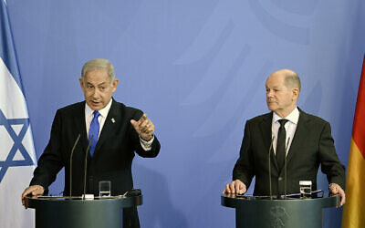 German Chancellor Olaf Scholz (R) and Israeli Prime Minister Benjamin Netanyahu give a joint press conference following talks at the Chancellery in Berlin on March 16, 2023. (Tobias SCHWARZ / AFP)