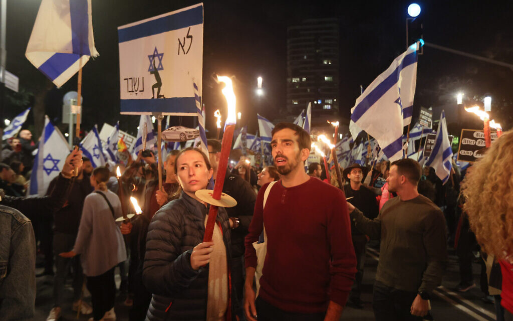 Protesters gather during a rally against the government's controversial judicial overhaul bill in Tel Aviv on March 18, 2023. (Jack Guez/AFP)