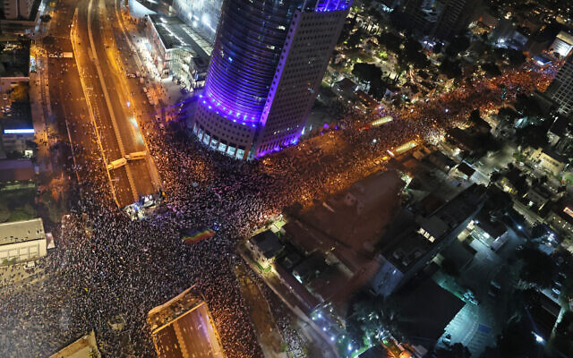 Protesters gather for an 11th straight week of protests against the government's controversial judicial overhaul bill in Tel Aviv on March 18, 2023. (Jack Guez/AFP)