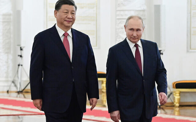 Russian President Vladimir Putin, right, meets with China's President Xi Jinping at the Kremlin in Moscow on March 21, 2023. (Photo by Pavel Byrkin / SPUTNIK / AFP)