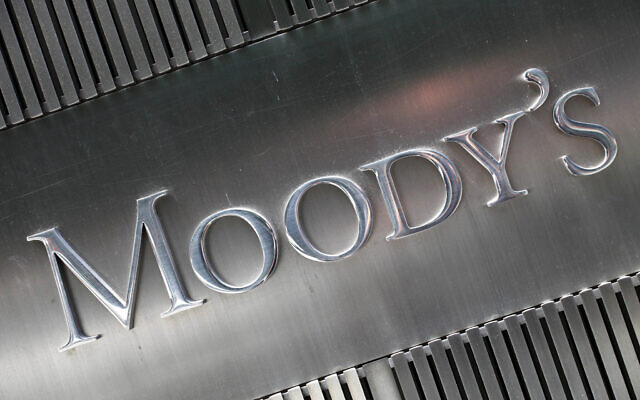 This Aug. 13, 2010 photo shows a sign for Moody's Corp. in New York.  (AP Photo/Mark Lennihan)