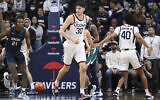 Connecticut's Yarin Hasson (30) in the second half of an NCAA college basketball game against UNC Wilmington, November 18, 2022, in Storrs, Connecticut. (AP Photo/Jessica Hill)