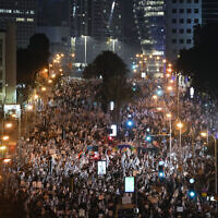 Tens of thousands of Israelis protest against plans by Prime Minister Benjamin Netanyahu's new government to overhaul the judicial system, in Tel Aviv, Israel, March 4, 2023. (AP Photo/Tsafrir Abayov)