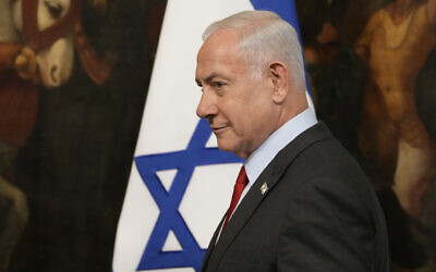 Prime Minister Benjamin Netanyahu arrives for a joint press conference with Italian Premier Giorgia Meloni at Chigi Palace government offices in Rome, Friday, March 10, 2023. (AP Photo/Andrew Medichini)