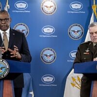 Secretary of Defense Lloyd Austin, left, accompanied by Chairman of the Joint Chiefs, Gen. Mark Milley, speaks during a briefing at the Pentagon in Washington, Wednesday, March 15, 2023. (AP/Andrew Harnik)