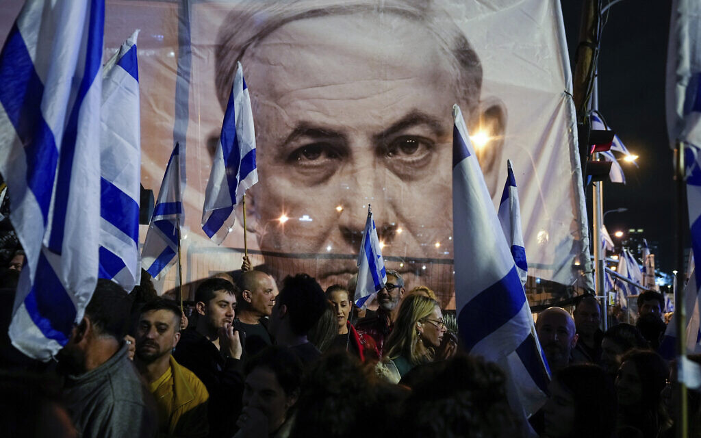 Israelis protest against plans by Prime Minister Benjamin Netanyahu's government to overhaul the judicial system, in Tel Aviv, March 18, 2023. (AP/Ohad Zwigenberg)