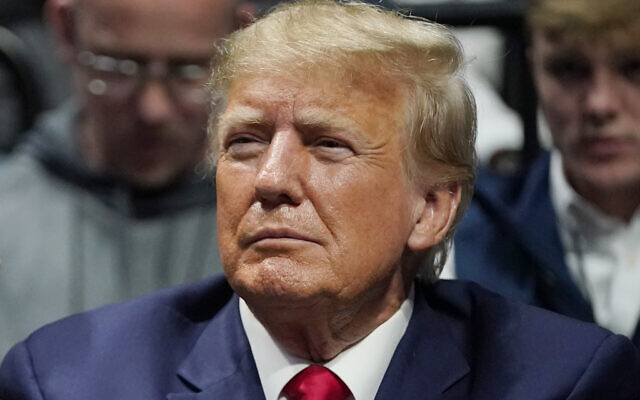 Former President Donald J. Trump watches the NCAA Wrestling Championships, Saturday, March 18, 2023, in Tulsa, Oklahoma (AP Photo/Sue Ogrocki, File)