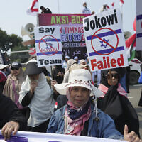 Protesters march during a protest against Israel's participation in the FIFA World Cup Under-20s, Jakarta, Indonesia, March 20, 2023. (AP/Achmad Ibrahim)