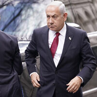 Prime Minister Benjamin Netanyahu arrives at 10 Downing Street in London, March 24, 2023. (AP Photo/Alberto Pezzali)