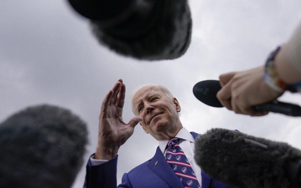 US President Joe Biden talks with reporters be he boards Air Force One at Raleigh-Durham International Airport in Morrisville, North Carolina, Tuesday, March 28, 2023, en route to Washington. (AP Photo/Carolyn Kaster)