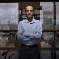 Israeli historian Yuval Noah Harari poses for a photo at his office in Tel Aviv, Thursday, March 30, 2023. (AP Photo/Oded Balilty)