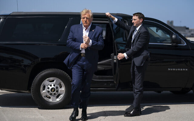 Former US president Donald Trump arrives to board his airplane for a trip to a campaign rally in Waco, Texas, at West Palm Beach International Airport, Saturday, March 25, 2023, in West Palm Beach, Fla. (AP Photo/Evan Vucci, File)