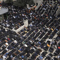 Palestinians take part in Friday prayers at the Al-Aqsa Mosque compound atop the Temple Mount in Jerusalem during the Muslim holy month of Ramadan, March 31, 2023. (AP Photo/Mahmoud Illean)