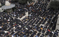 Palestinians take part in Friday prayers at the Dome of the Rock in the Al-Aqsa Mosque compound atop the Temple Mount in the Old City of Jerusalem during the Muslim holy month of Ramadan, Friday, March 31, 2023. (AP Photo/Mahmoud Illean)