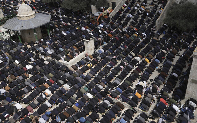 Palestinians take part in Friday prayers at the Al-Aqsa Mosque compound atop the Temple Mount in Jerusalem during the Muslim holy month of Ramadan, March 31, 2023. (AP Photo/Mahmoud Illean)