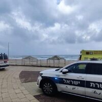 Police and Magen David Adom paramedics at the scene where the body of a man was found on a beachin Ashdod, March 15, 2023. (Magen David Adom)