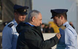 FILE: Prime Minister Benjamin Netanyahu attends the graduation ceremony of new Israeli Air Force pilots at the Hatzerim Air Force base, December 31, 2015 (Photo by Amos Ben Gershom/GPO)