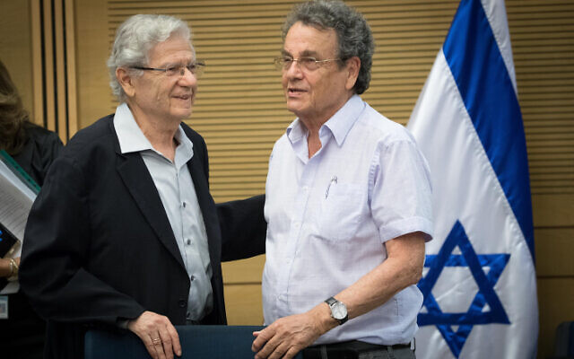 File: Former Justice Minister Daniel Friedmann (R) speaks with former Supreme Court president Aharon Barak at a hearing of the Knesset Constitution, Law and Justice Committee, July 9, 2017. (Yonatan Sindel/Flash90)