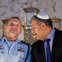 Police chief Kobi Shabtai, left, and Itamar Ben Gvir at a Hanukkah ceremony in Jerusalem on December 19, 2022. (Yonatan Sindel/Flash90)