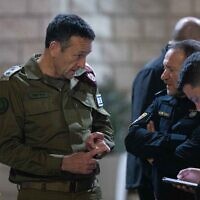 Chief of Police Kobi Shabtai speaks with IDF Chief of Staff, Herzi Halevi (left) at the Police headquarters in Jerusalem on January 27, 2023. (Yonatan Sindel/Flash90)