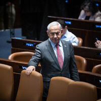 Prime Minister Benjamin Netanyahu in the assembly hall of the Knesset, in Jerusalem, on March 13, 2023. (Yonatan Sindel/Flash90)