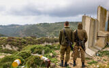 Israeli soldiers guard on the northern border between Lebanon and Israel,  March 15, 2023. (David Cohen/Flash90)