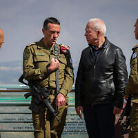 Defense Minister Yoav Gallant and IDF Chief of Staff Herzi Halevi seen during a tour on near the border with Lebanon, northern Israel, March 16, 2023. (David Cohen/Flash90)