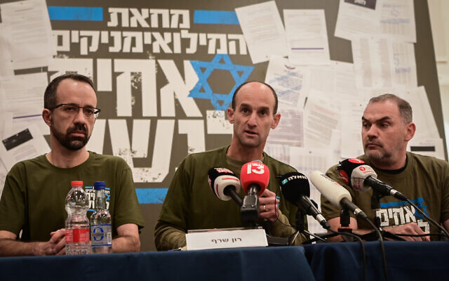 Members of the 'Brothers in Arms' reservist protest hold a press conference in Tel Aviv, March 21, 2023. (Avshalom Sassoni/Flash90)