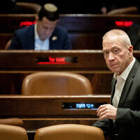 Defense Minister Yoav Gallant in the Knesset plenum in Jerusalem on March 22, 2023. (Yonatan Sindel/Flash90)