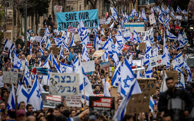 Israeli students march during a protest against the Israeli government's planned judicial overhaul, in Jerusalem, March 23, 2023. (Yonatan Sindel/Flash90)