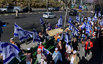 Israelis protest against the government's planned judicial overhaul, in Tel Aviv on March 28, 2023. (Tomer Neuberg/ Flash90)