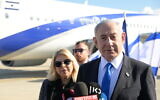 Prime Minister Benjamin Netanyahu and his wife Sara depart for Rome on March 9, 2023 (Amos Ben Gershom / GPO)