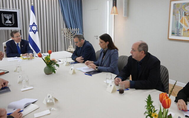 In this handout photo, President Isaac Herzog meets with representatives of the Labor party at the President's Residence in Jerusalem, March 29, 2023. (Amos Ben Gershom/GPO)
