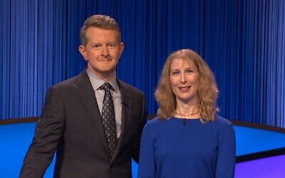 Melissa Klapper stands with 'Jeopardy!' host Ken Jennings during her March 2023 appearance on the show. (Courtesy Sony/Jeopardy!)