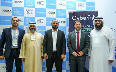 Cyberint CEO (second from right) with Etisalat by e&’s SVP of cybersecurity Ayman A AlShehi (right) at the GISEC Global cybersecurity conference in Dubai, March 14, 2023. (GEC Media Group/Courtesy)