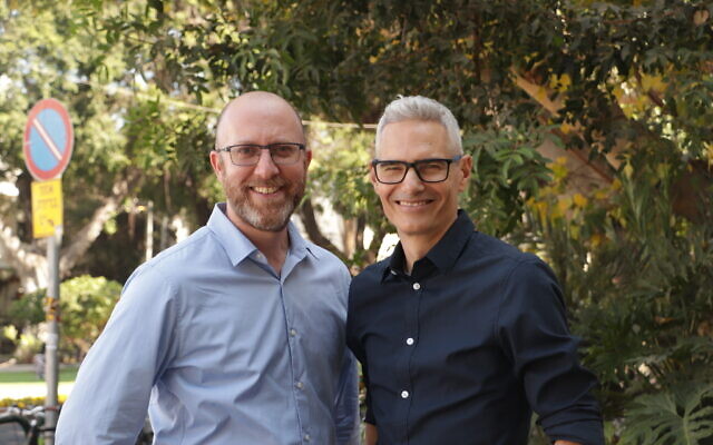 Benji Lovitt (left) and Joel Chasnoff at the launch of their new book, 'Israel 201, Your Next-Level Guide to the Magic, Mystery and Chaos of Life in the Holy Land, launched February 2023 (Courtesy Joel Chasnoff, Benji Lovitt)