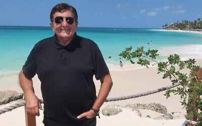 Rabbi Alberto (Baruch) Zeilicovich, seen at Eagle Beach in Aruba, recently came out of retirement to become the spiritual leader of Temple Beth Israel on the southern Caribbean island. (Dan Fellner/ JTA)