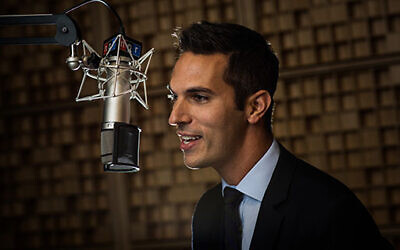 Ari Shapiro behind the microphone as host of NPR's 'All Things Considered.' (Stephen Voss/NPR)