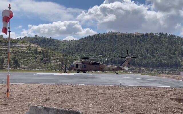 An Air Force helicopter hired to fly Prime Minister Benjamin Netanyahu to the airport waits at the launchpad at Jerusalem's Hadassah Ein Kerem hospital, March 9, 2023. (Screenshot: Twitter; used in accordance with Clause 27a of the Copyright Law)