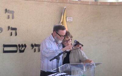 The parents of Elon Ganeles, killed in a terror attack near the Dead Sea, eulogize their son at his funeral in Ra'anana, March 1, 2023. (Screenshot/Youtube; Used in accordance with Clause 27a of the Copyright Law)