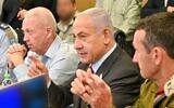 Defense Minister Yoav Gallant (left), Prime Minister Benjamin Netanyahu and IDF Chief of Staff Herzi Halevi observe a joint US, Israeli military exercise at the Air Force command center, January 25, 2023. (Kobi Gideon/GPO)