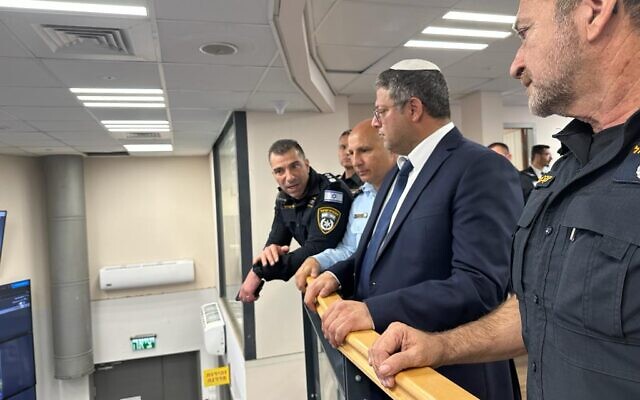 National Security Minister Itamar Ben Gvir (second from left) in the Traffic Police's National Control Center with Police Commissioner Kobi Shabtai (left) on March 9, amid nationwide protests against the government's judicial overhaul program. (Courtesy National Security Ministry)