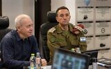 Defense Minister Yoav Gallant is seen with IDF Chief of Staff, Lt. Gen. Herzi Halevi (right) during a briefing at the 91st territorial division base, at the Biranit camp on the Lebanon border, March 16, 2023. (Elad Malka/Defense Ministry)